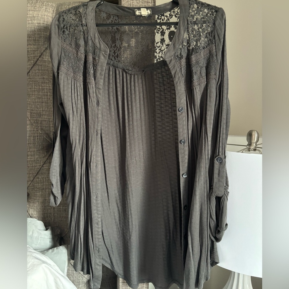 Darker gray colored cardigan